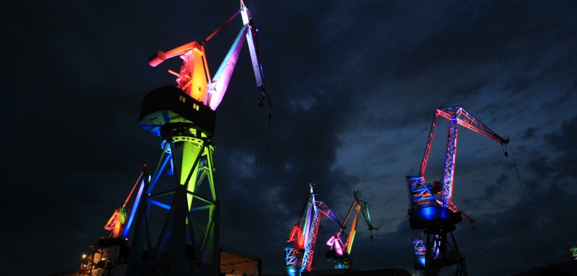 Projected lights turn shipyard cranes into alien machines