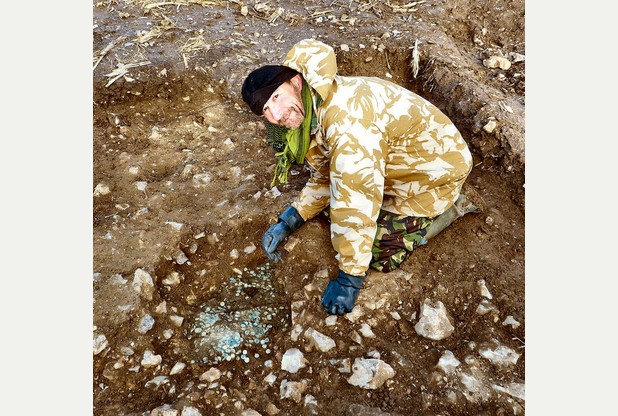 Treasure hunter discovers hoard of 22,000 Roman coins