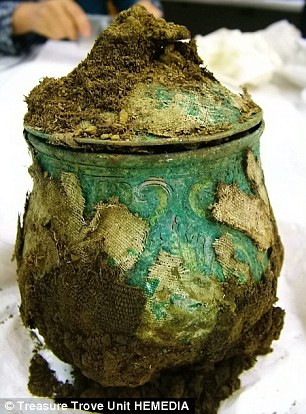 CT scans of treasure chest reveal hidden brooches, gold ingots and ivory beads